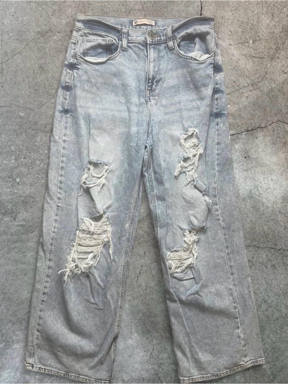 Light Wash Wide Leg
Distressed Denim Jeans